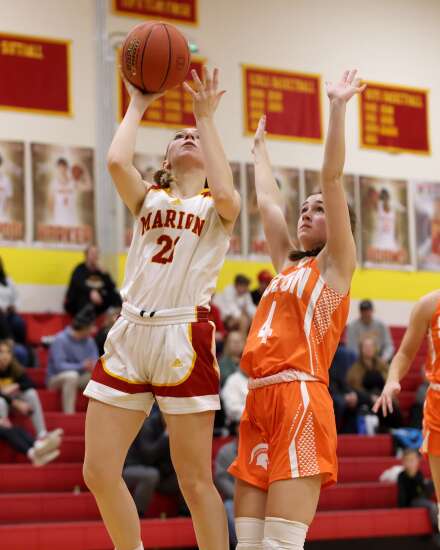 Photos: Solon, Marion split high school basketball doubleheader
