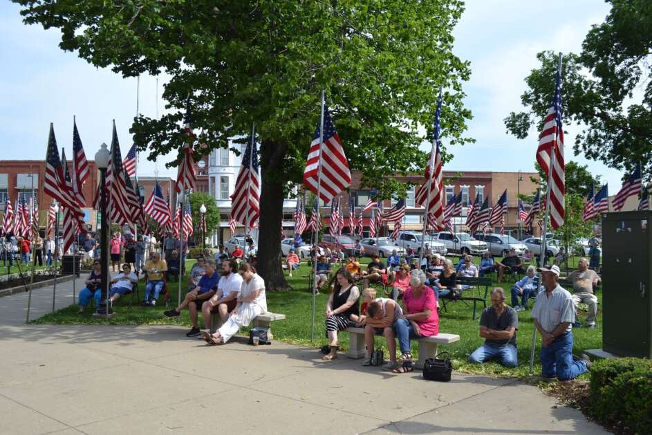 Residents sat on benches and lawn chairs in Fairfield’s Central Park while paying their respects to the nation’s veterans during the Memorial Day service Monday. (Andy Hallman/The Union)