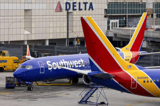 Southwest cancels more flights, draws federal investigation