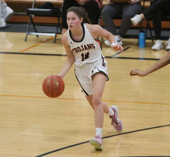 Demons, Trojans out in girls basketball