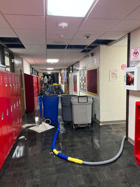 A hallway at Francis Marion Intermediate School in the Marion Community School District with standing water after a partial roof collapsed Wednesday evening, Oct. 11, 2023. (Photo provided by Janelle Brouwer)