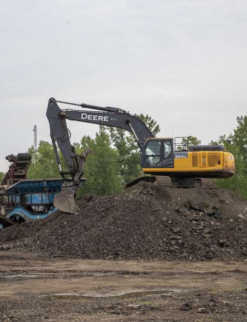 Heavy machinery sits Wednesday on the Stickle property recently purchased by the city of Cedar Rapids. (Savannah Blake/The Gazette)