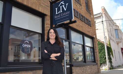 LIV Real Estate opens in former Ledger building