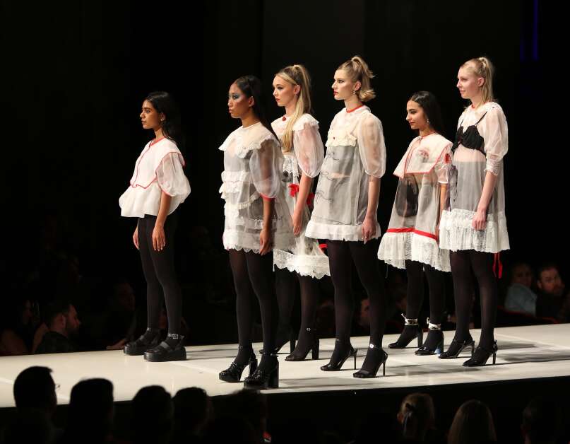 Models pose April 15 while wearing "Girl by Spear," designed by Chanel Spear, at The Fashion Show at Stephens Auditorium in Ames. (Bailey Cichon/The Gazette)