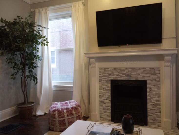 Lines on Design: Avoid placing a TV above the fireplace