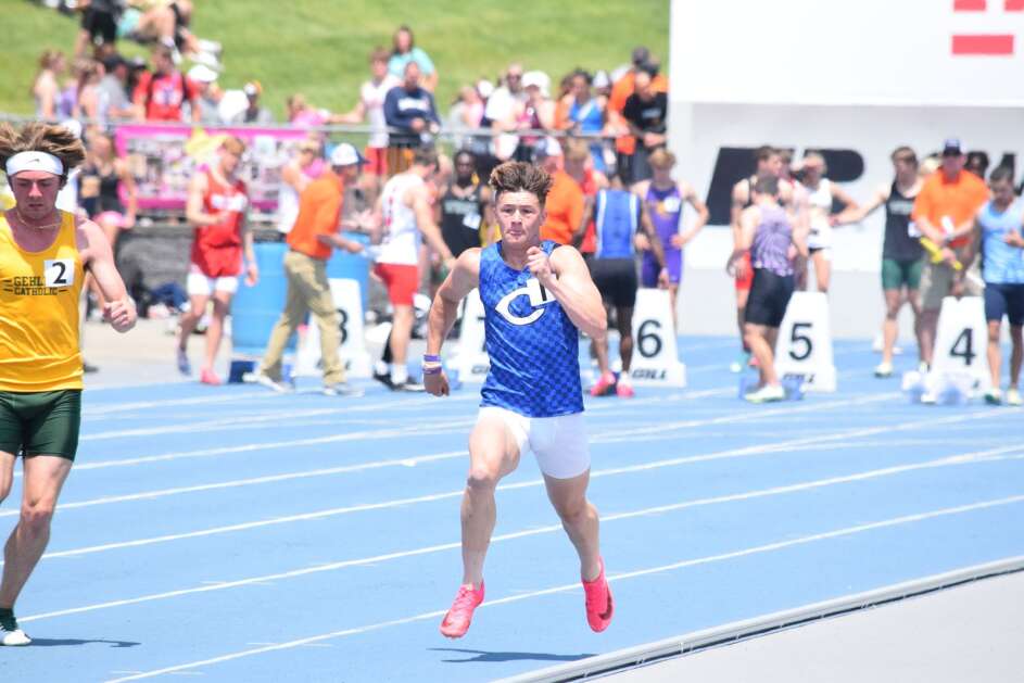 Columbus’ Jeff Hoback runs in the 100-meter final at the High School Track and Field Championship. Hoback finished eighth in the event. (Hunter Moeller/The Union)