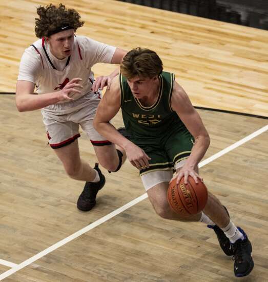 Photos: Iowa City West vs. Iowa City High Boy’s Basketball