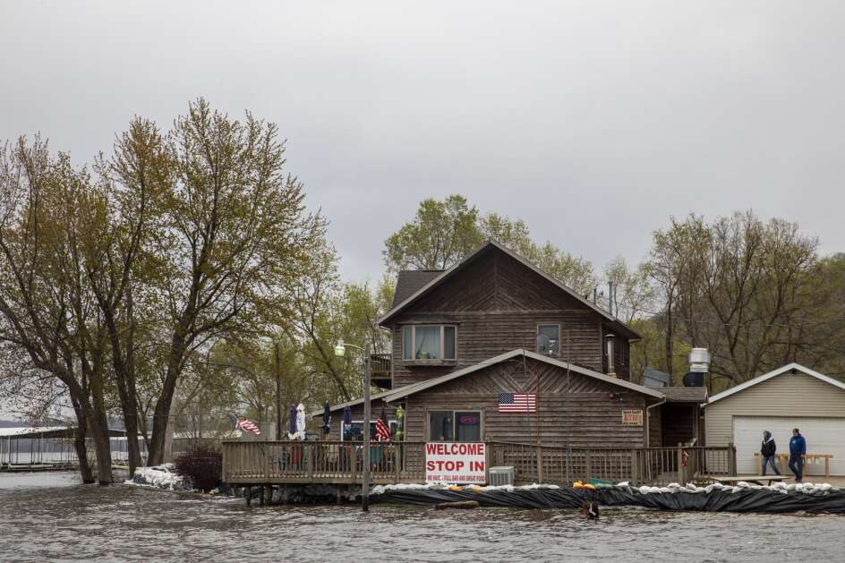 The Bill’s Boat Landing bar and restaurant in Clayton, Iowa on Sunday, April 30, 2023. The restaurant remained open in spite of high water relying on sandbags and volunteers to keep the river at bay. (Nick Rohlman/The Gazette)