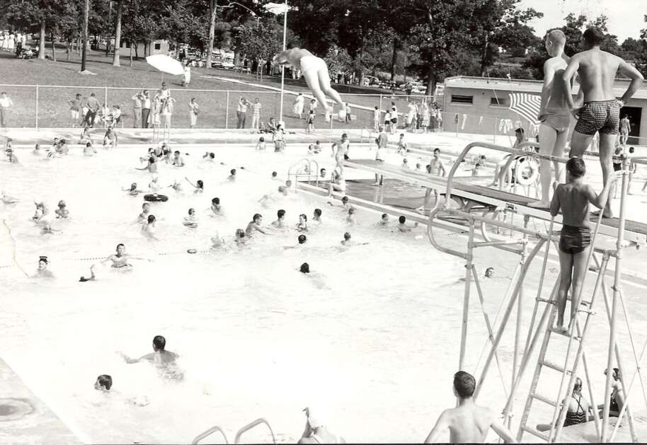 This photo from the 1940s shows the first public swimming pool in Cedar Rapids at Ellis Park. The pool, which opened in June 1941, initially barred people of color from entry, but that policy was dropped in 1945 after the NAACP threatened to sue. (The History Center) 