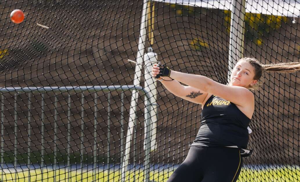 Iowa's Amanda Howe winds up to throw during the championship women's hammer throw at the 2023 Drake Relays at Drake Stadium in Des Moines, Iowa, on Saturday, April 29, 2023. Howe finished second with a throw of 63.71. (Jim Slosiarek/The Gazette)