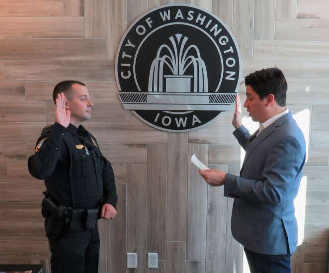 New Washington police officer swears in