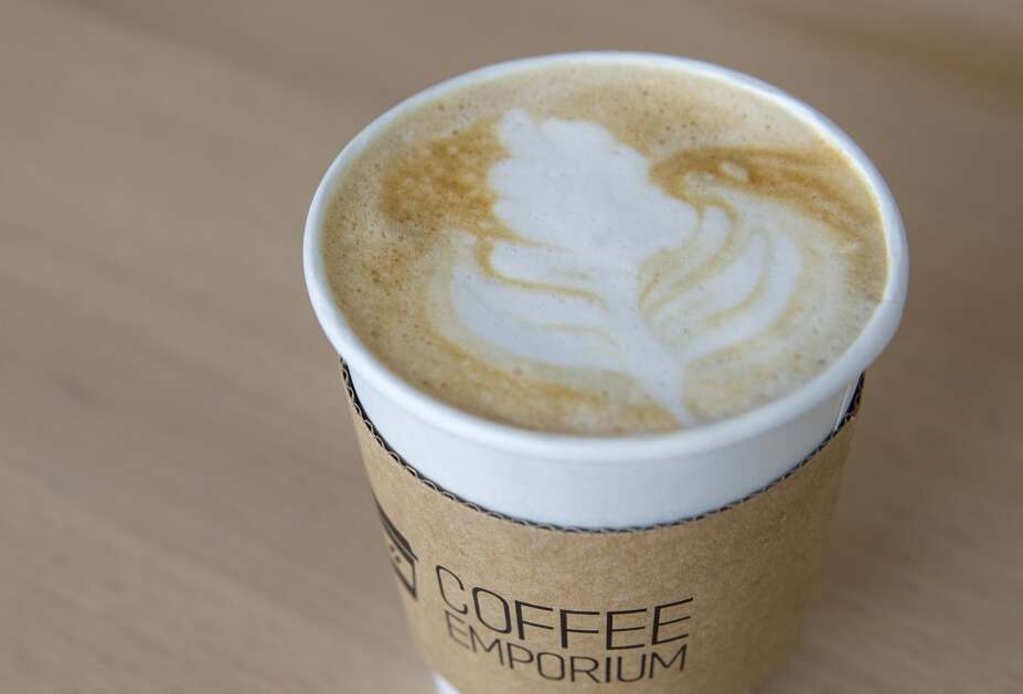 A latte at the Coffee Emporium in Tiffin, Iowa, on Thursday, May 18, 2023. (Savannah Blake/The Gazette)