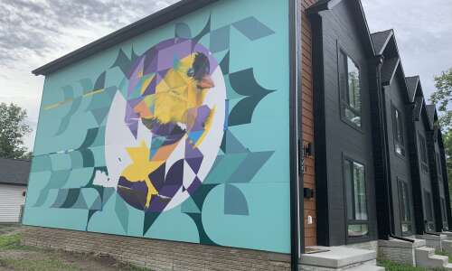Maryland artists add two murals to Time Check neighborhood