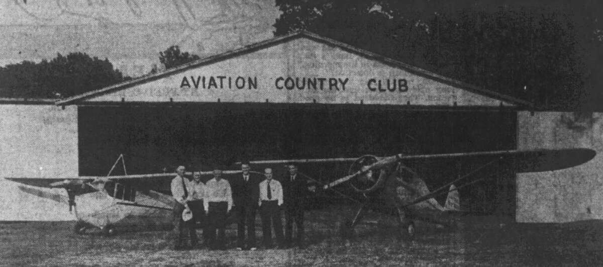 Left to right: R.V. Nelson, Owen Smith, W.T. Saxon, R.H. Olson, J.L. Seely and Montelle Knapp, members of the Aviation Country Club, stand in front of two of the planes that were housed in the hangar behind them at Faulkes Field in June 1937. Charter members were Olson, Nelson, Saxon and John St. Aubin, who is not in the picture. Gazette photo