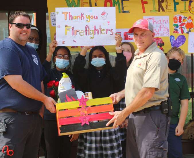 Maharishi School students give gift basket to Fairfield firefighters