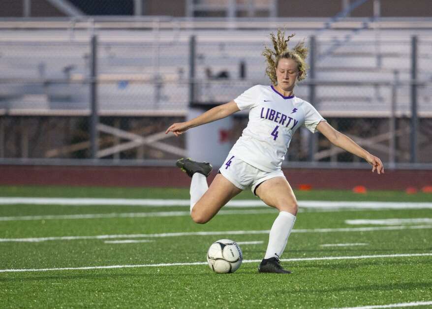 Iowa City Liberty midfielder Rilyn Breinholt (4) drives the ball towards the Marion goal in the second half of the game at Marion High School in Marion, Iowa on Thursday, May 25, 2023. (Savannah Blake/The Gazette)