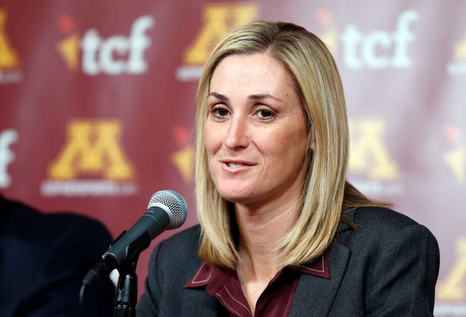 FILE - In this Nov. 11, 2015, file photo, University of Minnesota interim athletic director Beth Goetz takes a question after she introduced new head football coach Tracy Claeys during an NCAA college football news conference  in Minneapolis. Minnesota deputy athletic director Beth Goetz, passed over for the top job, has decided to leave the university to become chief operating officer of the Connecticut athletic department, the university announced Thursday, June 9, 2016. Goetz was appointed interim athletic director at Minnesota last August, when her boss Norwood Teague resigned amid complaints of sexual harassment. (AP Photo/Jim Mone, File)