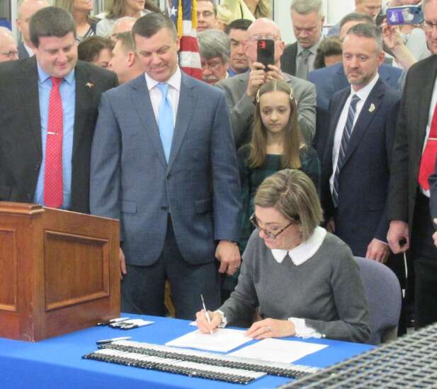 Iowa Gov. Kim Reynolds signs into law $1.9 billion in tax cuts
