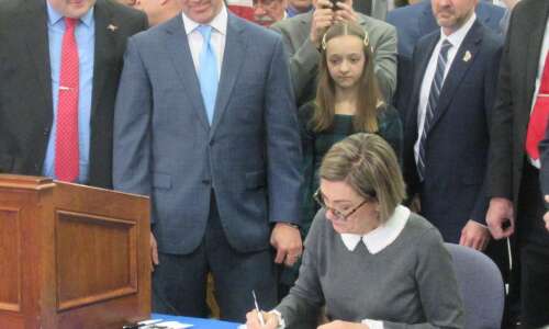 Iowa Gov. Reynolds signs into law $1.9B in tax cuts