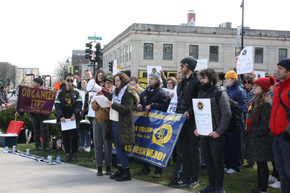 The University of Iowa’s Campaign to Organize Graduate Students rallied Wednesday on the Pentacrest in Iowa City in support of a petition they distributed to UI administrators seeking an end to all graduate worker fees. (Photo submitted by UI research assistant and COGS member Nicole Yeager)