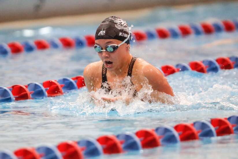 Iowa high school girls’ swimming powers split up for regionals