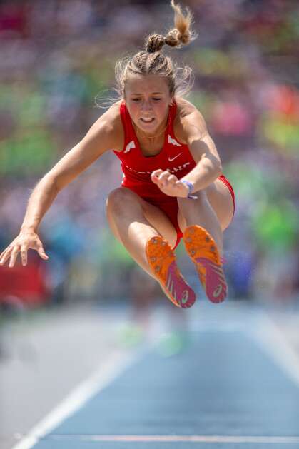 Highland’s Sarah Burton competes in the long jump on day 1 of the Iowa Track and Field State Championship Meet in Des Moines, Iowa on Thursday, May 18, 2023. (Nick Rohlman/The Gazette)