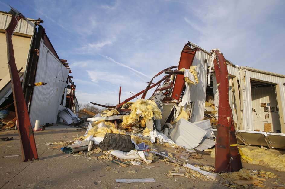 Wreckage is seen Friday at the University of Iowa's College of Engineering's James Street Laboratory in Coralville. The facility, destroyed in a March 31 tornado, housed a river model used in hydroscience research. (Jim Slosiarek/The Gazette)