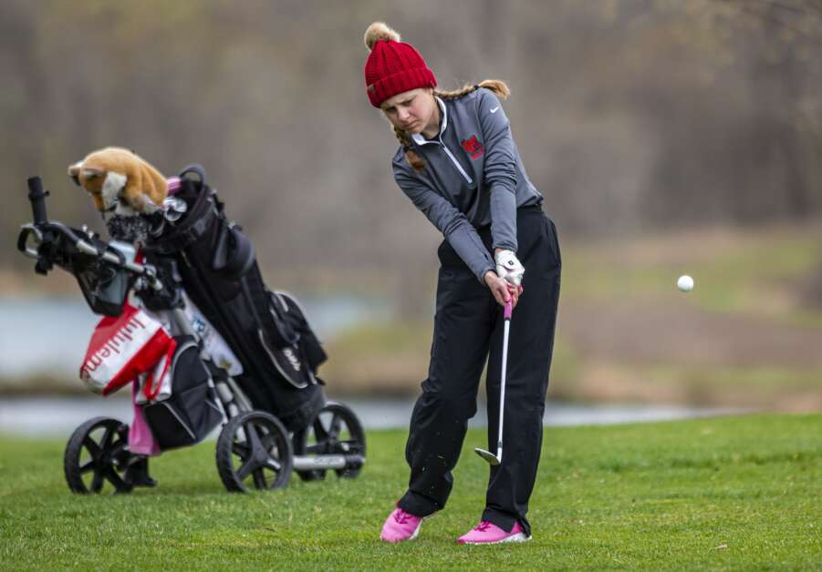 Linn-Mar’s Morgan Rupp hits a shot during the CRANDIC girls’ golf tournament at Gardner Golf Course in Cedar Rapids, Iowa on Wednesday, April 19, 2023. (Nick Rohlman/The Gazette)