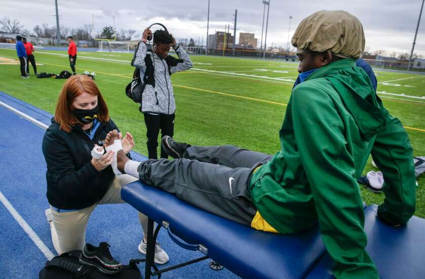 Iowa high school trainers miss connection with athletes during COVID season