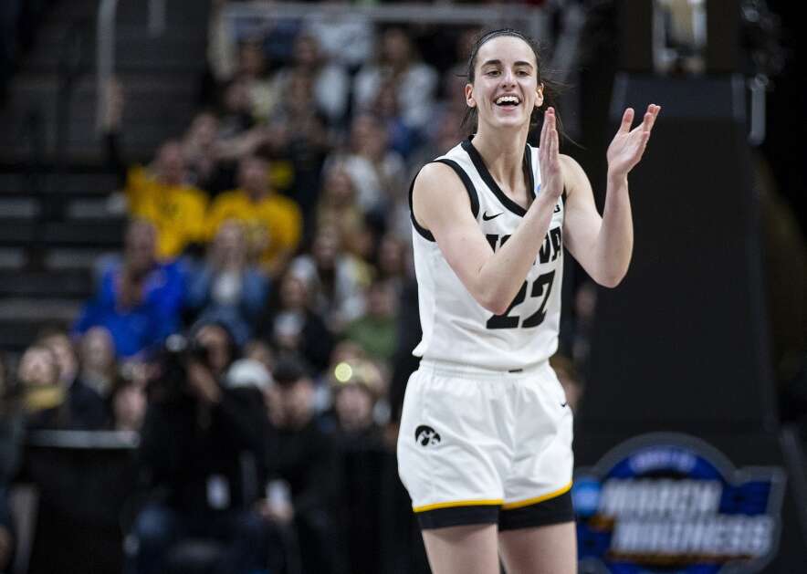 Iowa Hawkeyes guard Caitlin Clark (22) reacts as the Hawkeyes pull further ahead in points over Colorado in the fourth quarter during a NCAA Sweet Sixteen game at MVP Arena in Albany, New York on Saturday, March 30, 2024. (Savannah Blake/The Gazette)


