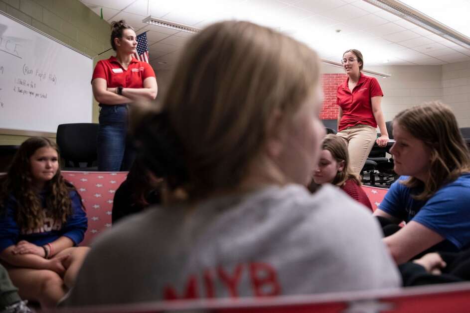 Emily Damro (right), 4H Youth Program specialist for Linn County, walks participants through an exercise to help combat bullying on Thursday, May 4, 2023, at Vernon middle school in Marion, Iowa. (Geoff Stellfox/The Gazette)