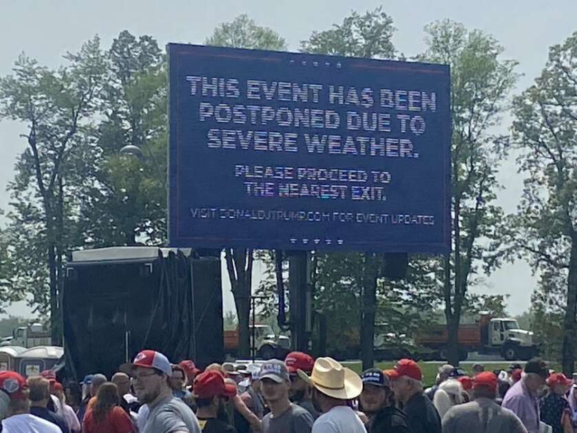 A video billboard announces the cancellation of former President Donald Trump's planned campaign rally at Des Moines Water Works Park in Des Moines on Saturday. (Erin Murphy/The Gazette)