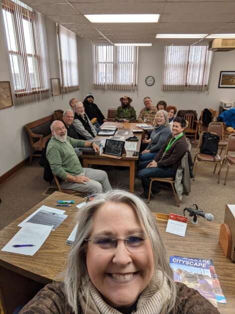 Sarah Thompson, rural development director at ICAD, takes a selfie during the downtown walk in Johnson County. The walking tours included strolls through Hills, Lone Tree, Oxford, Swisher and Tiffin. (Sarah Thompson)