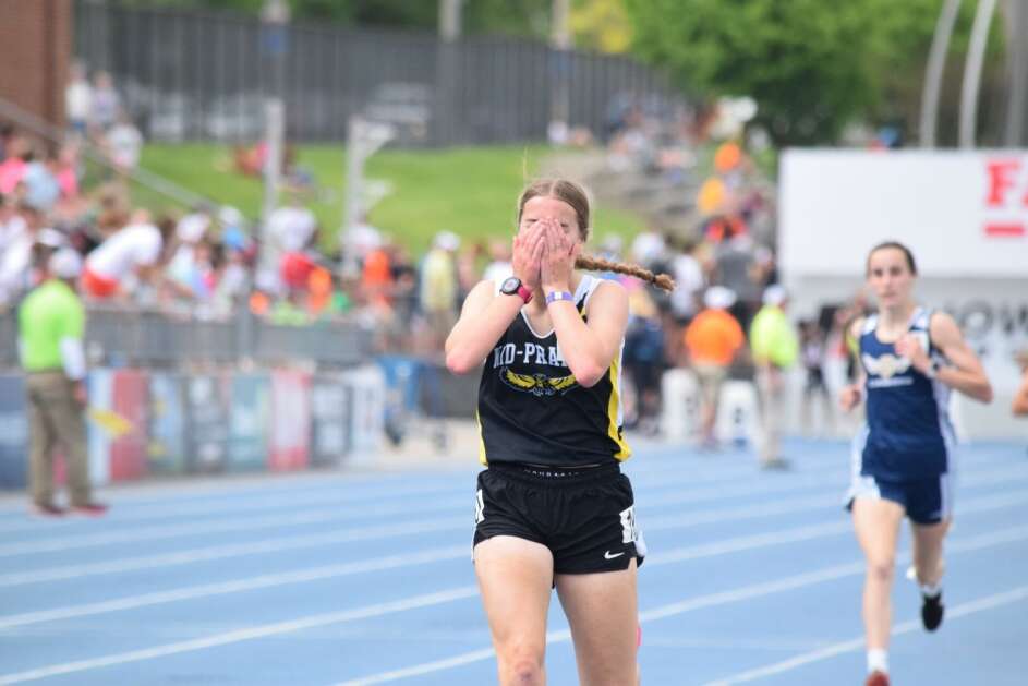 Mid-Prairie’s Danielle Hostetler gets emotional as she crosses the finish line in the Class 2A girls’ 3000-meter race on Thursday at the 2023 state track and field meet. (Hunter Moeller/The Union)
