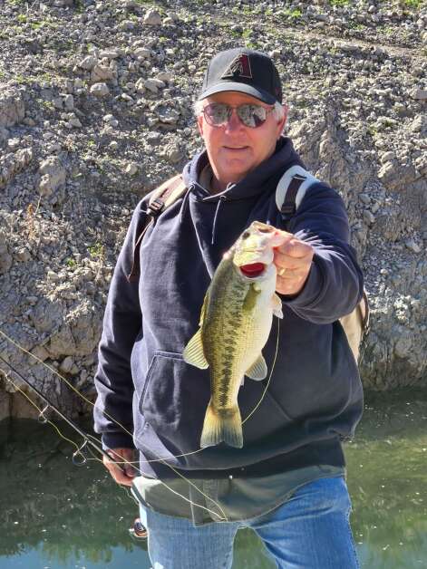 After a bit of mentoring, Doug Newhoff got on the board with this Arizona largemouth while sight-fishing from the hills above the water at Lake Pleasant northwest of Phoenix. (Mike Wirth)