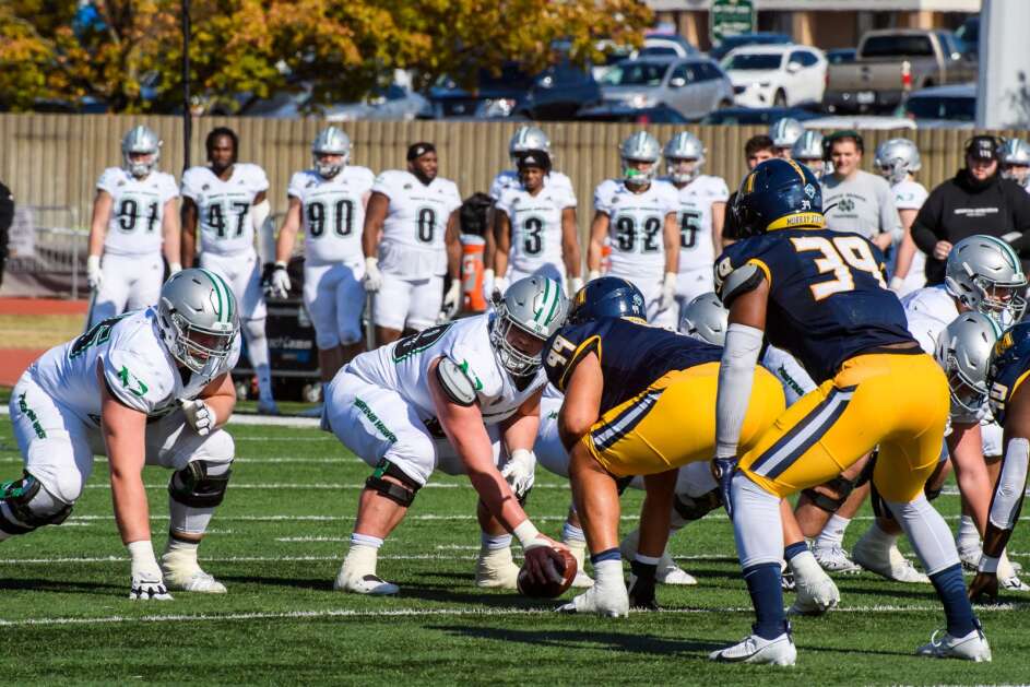 North Dakota center Cade Borud (second from left) prepares to snap the ball in a 2023 game against Murray State. Borud’s Fighting Hawks won, 45-31. (Photo courtesy of UND Athletics)