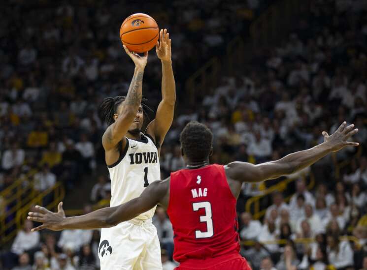 Hawkeyes put defense-minded Rutgers on wrong side of shootout, win 93-82 