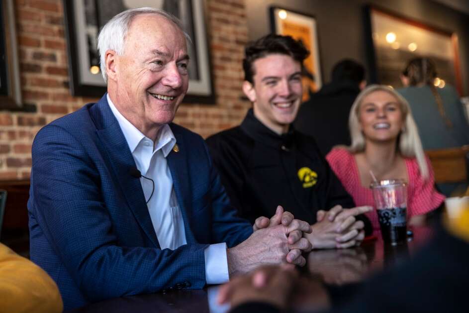 2024 GOP presidential candidate and former Arkansas Gov. Asa Hutchinson addresses questions from the University of Iowa College Republicans on Monday, May 1, 2023, at Heirloom Salad Company in Iowa City, Iowa. (Geoff Stellfox/The Gazette)