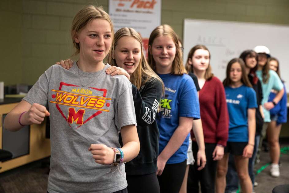Eighth grader Maggie Trilk leads her fellow students on the “school bus” exercise on discussing stressful scenarios on Thursday, May 4, 2023, at Vernon middle school in Marion, Iowa. (Geoff Stellfox/The Gazette)