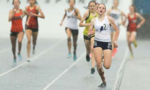Soaked and triumphant, Ashley Keeney wins 4A 800 and 1,500