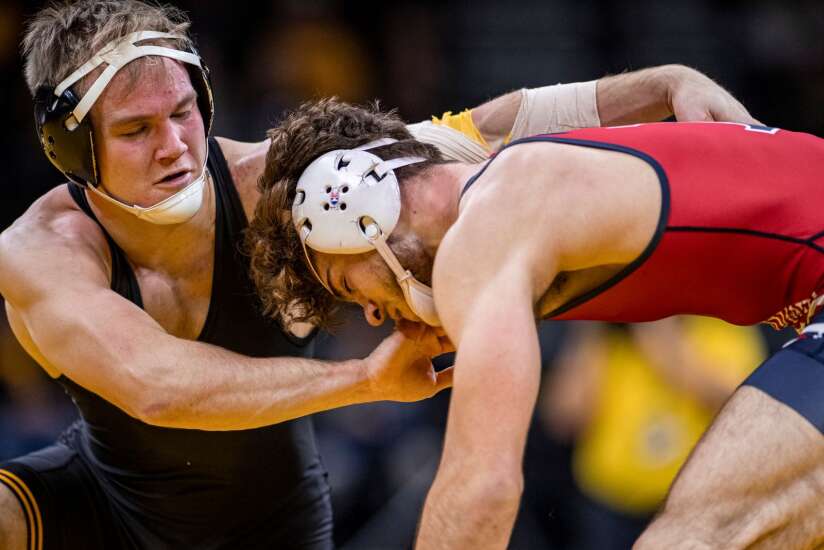 If Iowa’s Nelson Brands isn’t wrestling, he’s probably climbing mountains