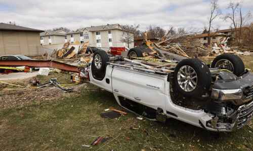 How much did extreme weather cost Iowa in 2023?