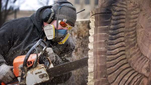 Chain saw artists turn derecho destruction into works of art