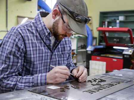 Hiawatha business FiddleSticks creates products with laser