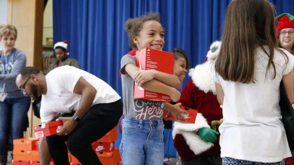 Nonprofit donates hundreds of Nikes to Garfield Elementary students
