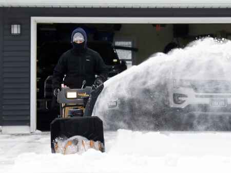 ‘Stay home,’ road crews tell residents as they work to clear roads