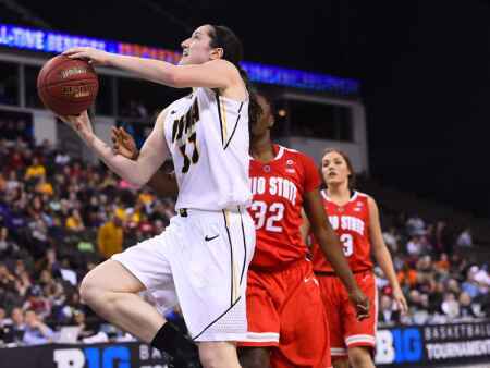 Iowa women ousted in overtime
