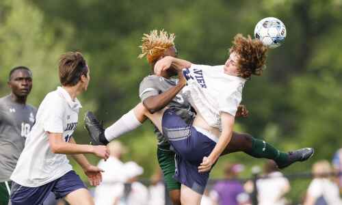 Photos: Xavier vs. Des Moines Hoover in state soccer quarterfinals