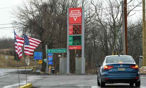 Gas tops $4 per gallon average
