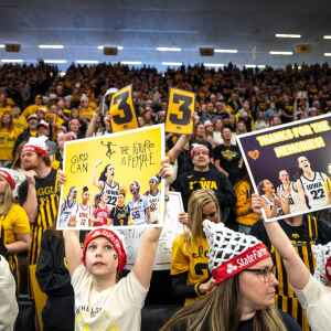 How many fans turned out for Iowa WBB, MBB games in 2023-24